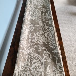 Pottery Barn curtains each panel is 84 inches in lengths. 55” wide